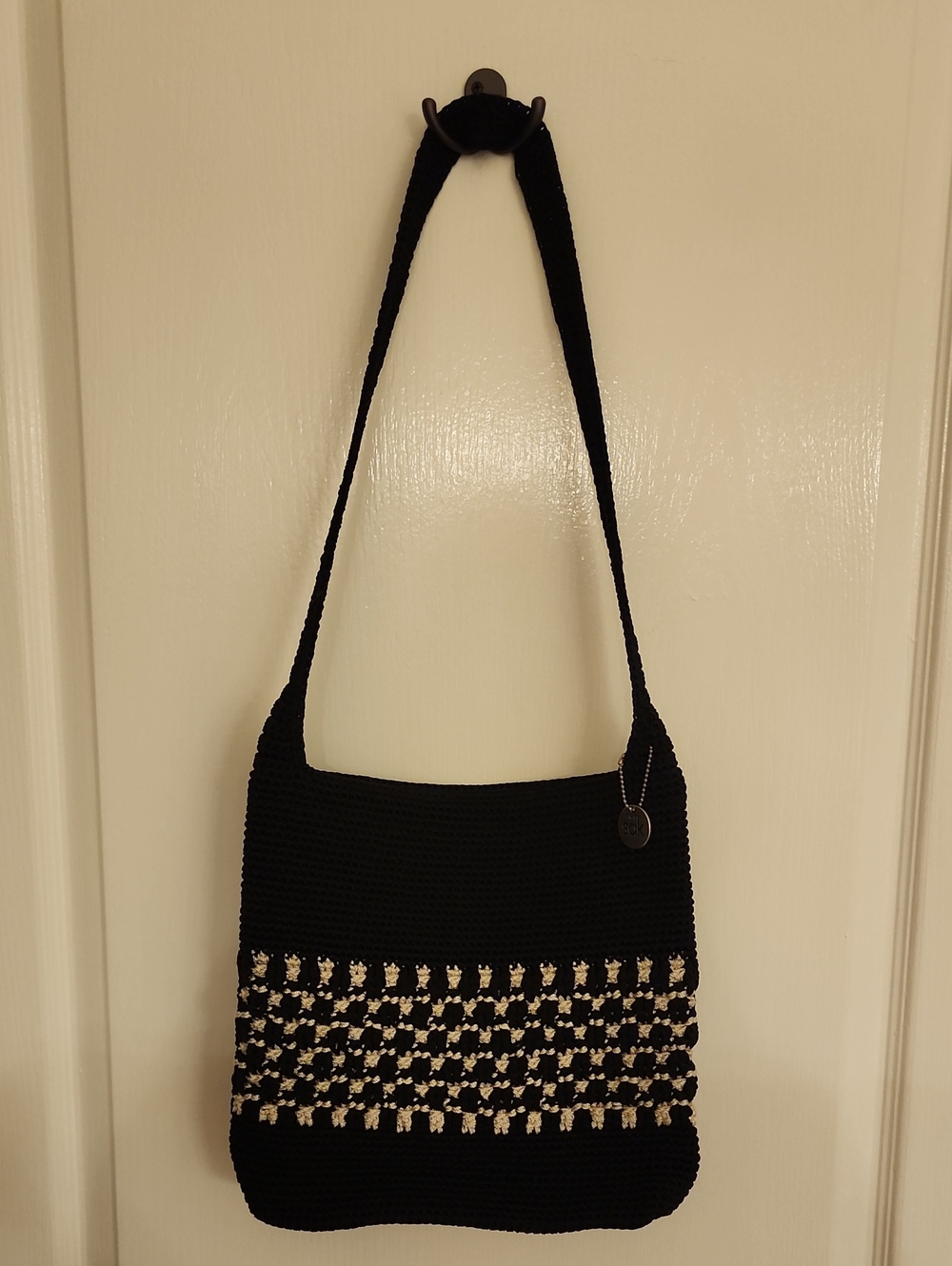 The SAK Black & Ivory Crochet Shoulder Bag